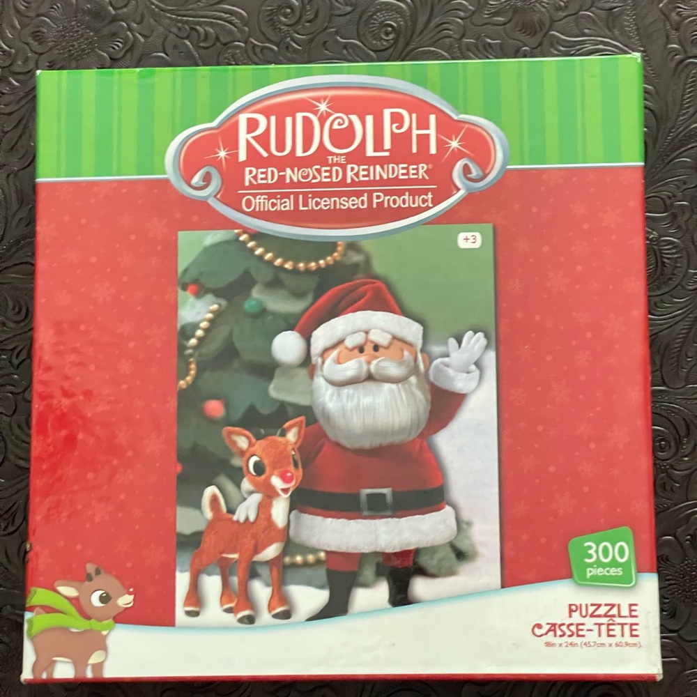 Rudolph the red nosed reindeer and Santa puzzle.  300 pieces